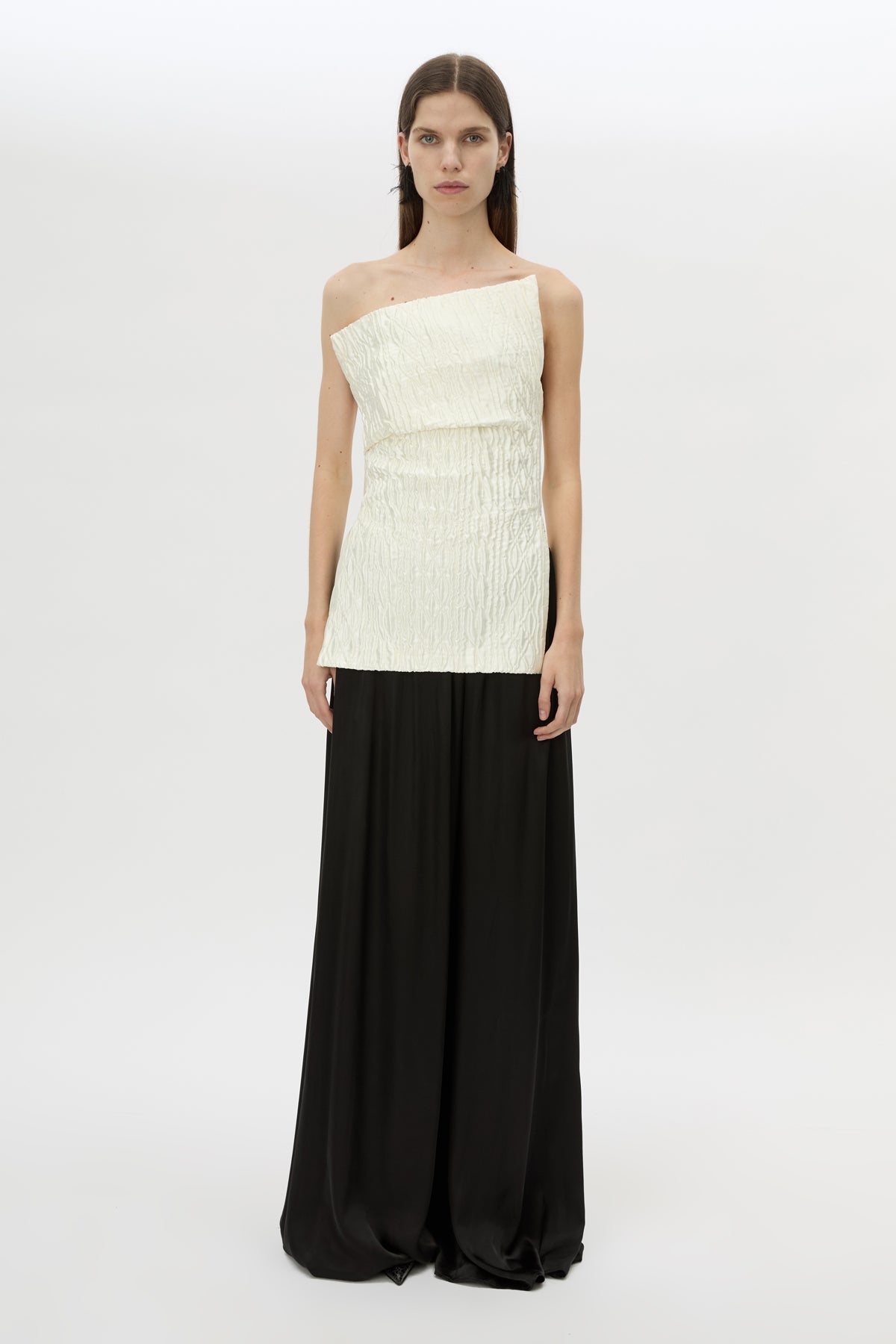 Front styled view CAMILLA AND MARC Elise Top in Cream with sculpted fit, off‑shoulder design and side hem splits.