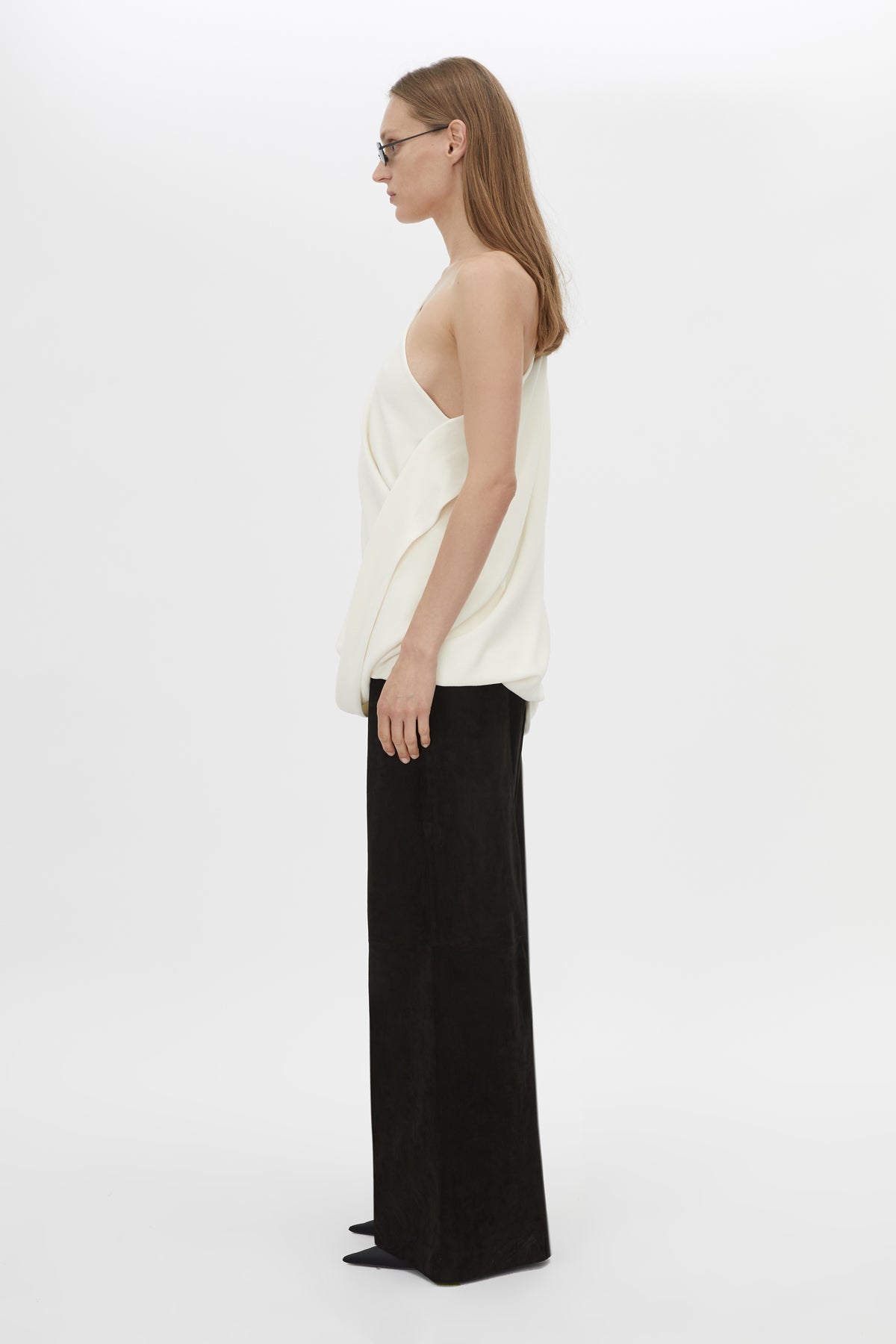 Side view CAMILLA AND MARC Eon Top in Cream with a draped asymmetric silhouette.
