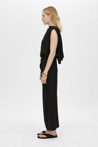 Side View CAMILLA AND MARC Eon Maxi Dress in black with cowl back and detachable beaded strap detail. 