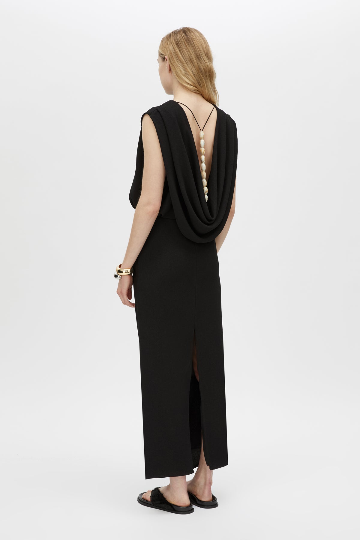 Back View CAMILLA AND MARC Eon Maxi Dress in black with cowl back and detachable beaded strap detail. 