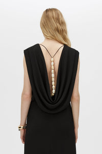 Back close up view CAMILLA AND MARC Eon Maxi Dress in black with cowl back and detachable beaded strap detail. 